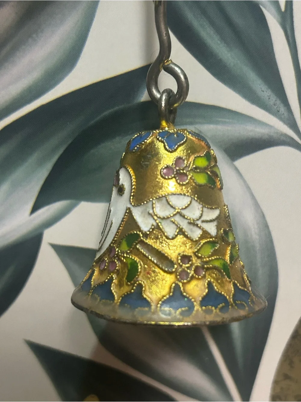 This is a Vintage Cloisonné Enamel Candle Snuffer.